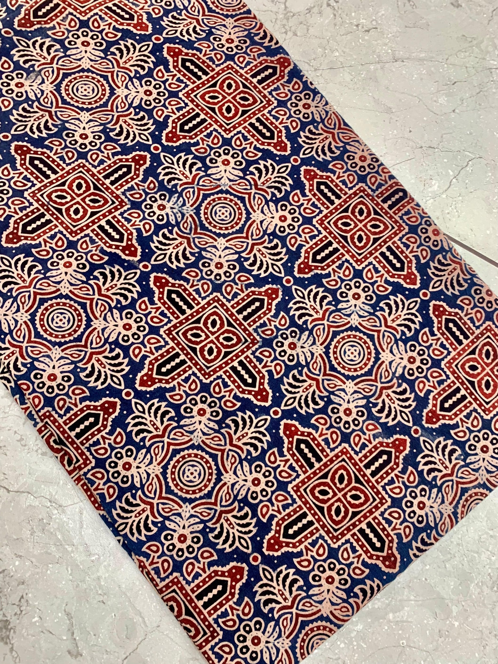 Indigo-blue Ajrakh handblock printed pure cotton wholesale fabric crafted in traditional natural dye style by Fabtexs.